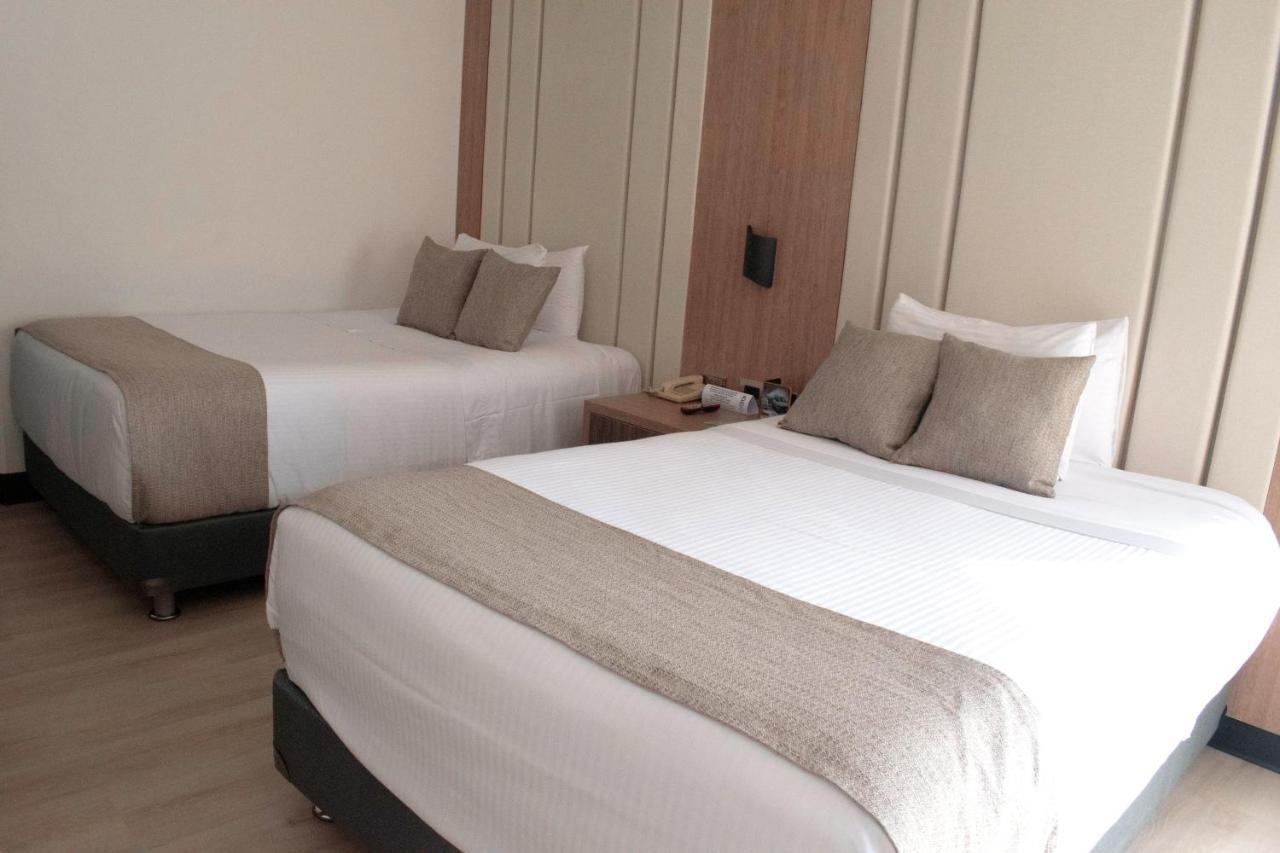 Hotel Dann Carlton Belfort מדיין מראה חיצוני תמונה A room at the hotel